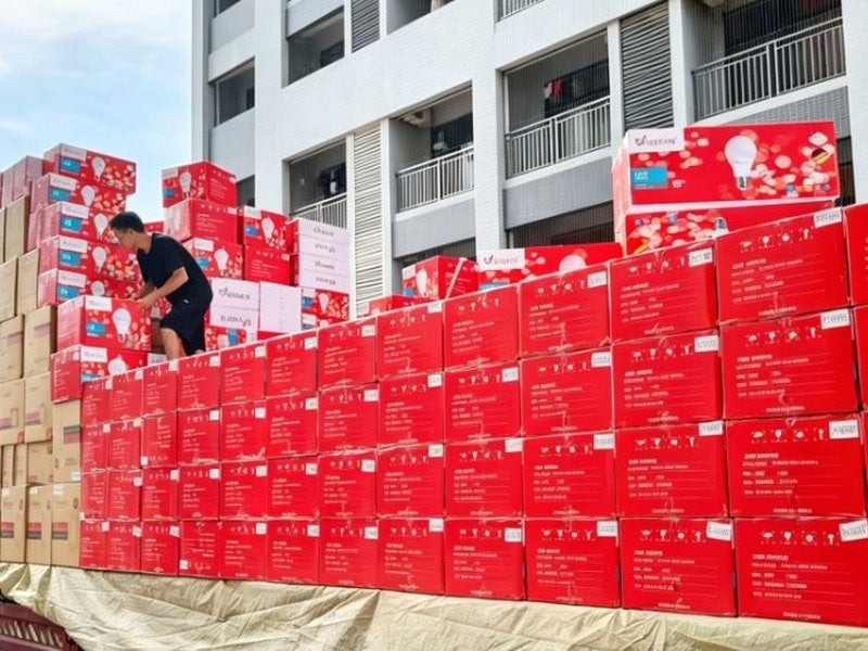 CHZM red product cartons stacked and ready for export shipment